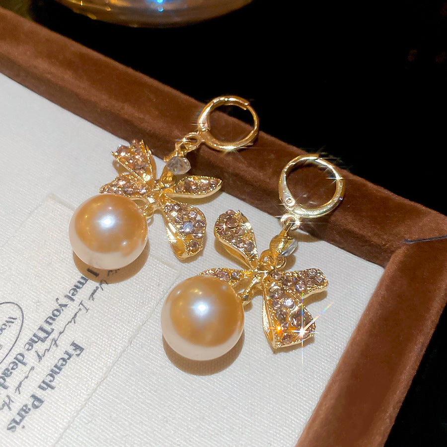 A2廠 韓國韓版鑲鑽蝴蝶結珍珠耳環  批發 折扣@洽客服 26.01.W1「HE29796」