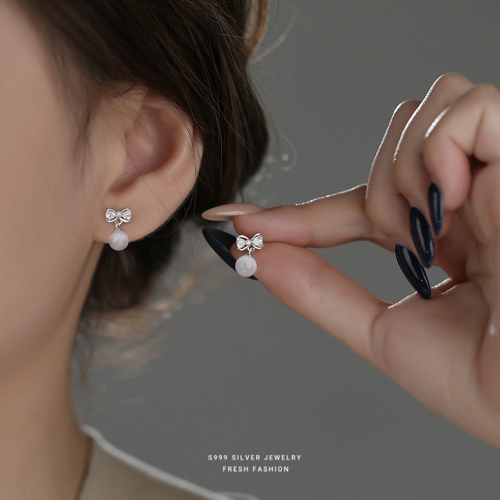 C廠 韓國韓版白貓眼石蝴蝶結S999純銀耳環 批發 折扣@洽客服 25.11.W3「E5787」