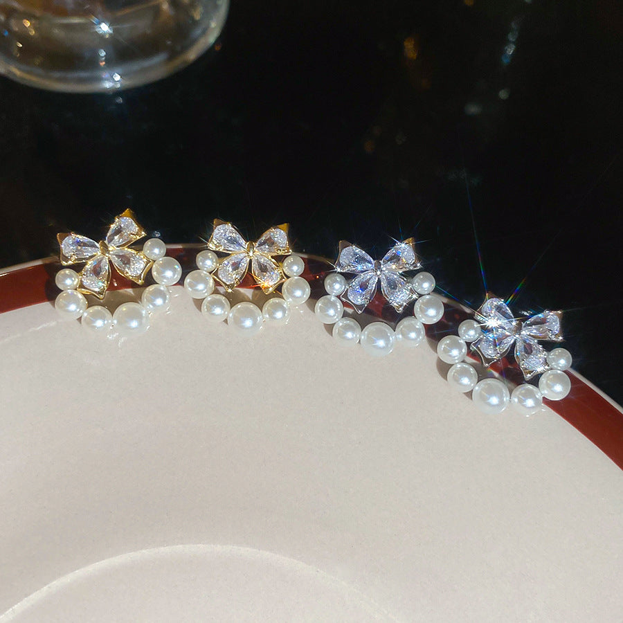 A2廠 韓國韓版鋯石蝴蝶結珍珠銀針耳環 批發 折扣@洽客服 26.03.W1「HE30793」