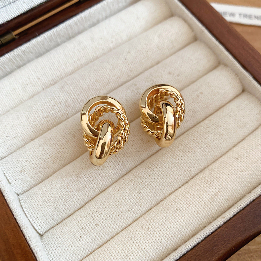 A2廠 韓國韓版金屬圓纏繞銀針耳環批發 折扣@洽客服 26.04.W4「HE31476」