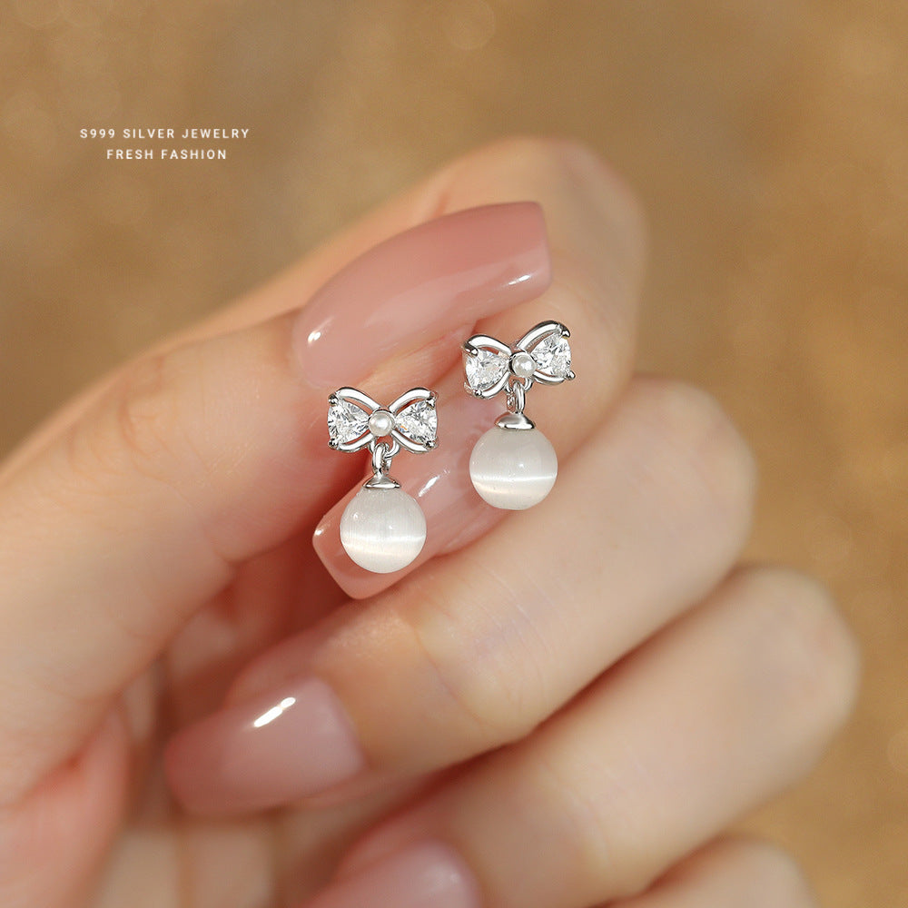 C廠 韓國韓版白貓眼石蝴蝶結S999純銀耳環 批發 折扣@洽客服 25.11.W3「E5787」