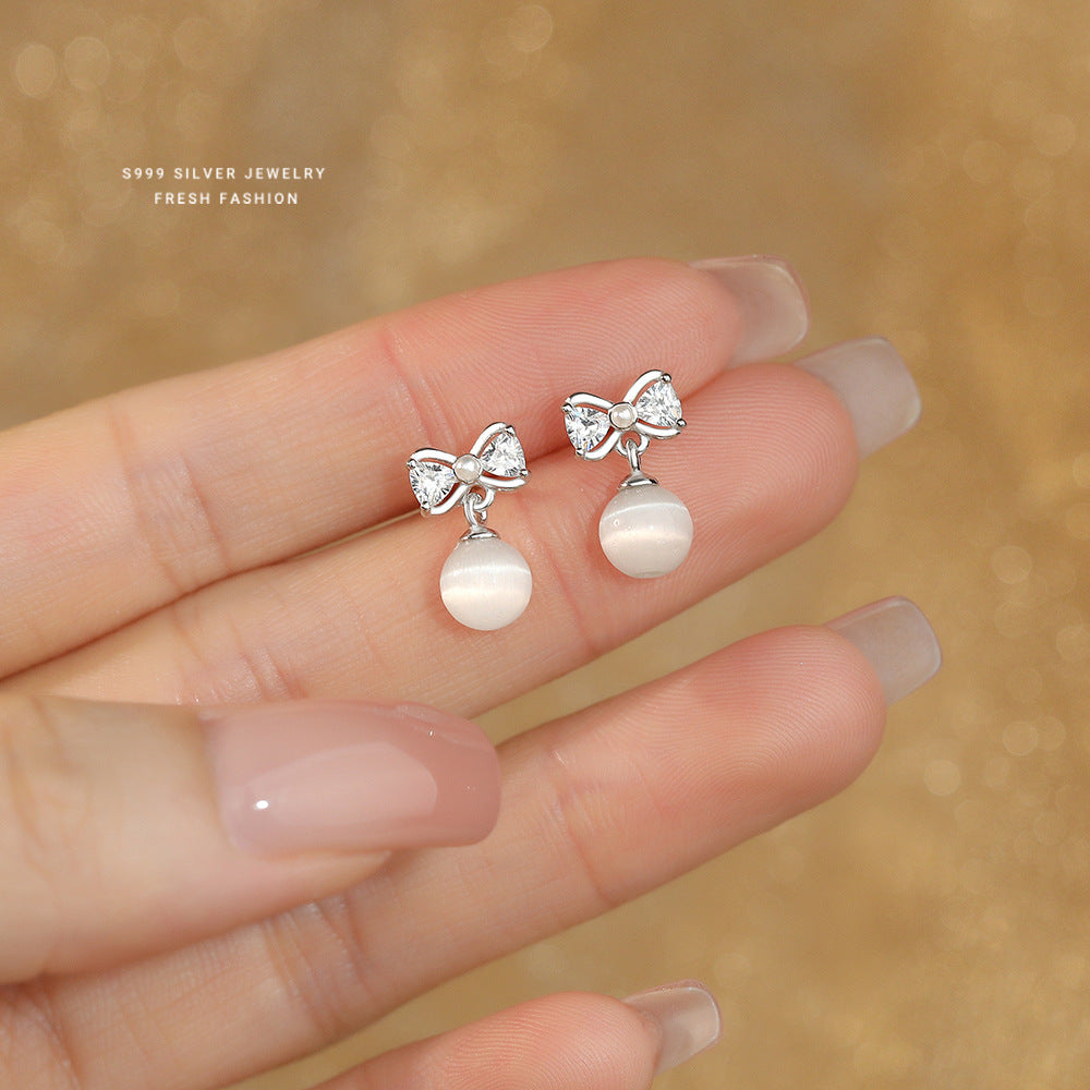 C廠 韓國韓版白貓眼石蝴蝶結S999純銀耳環 批發 折扣@洽客服 25.11.W3「E5787」