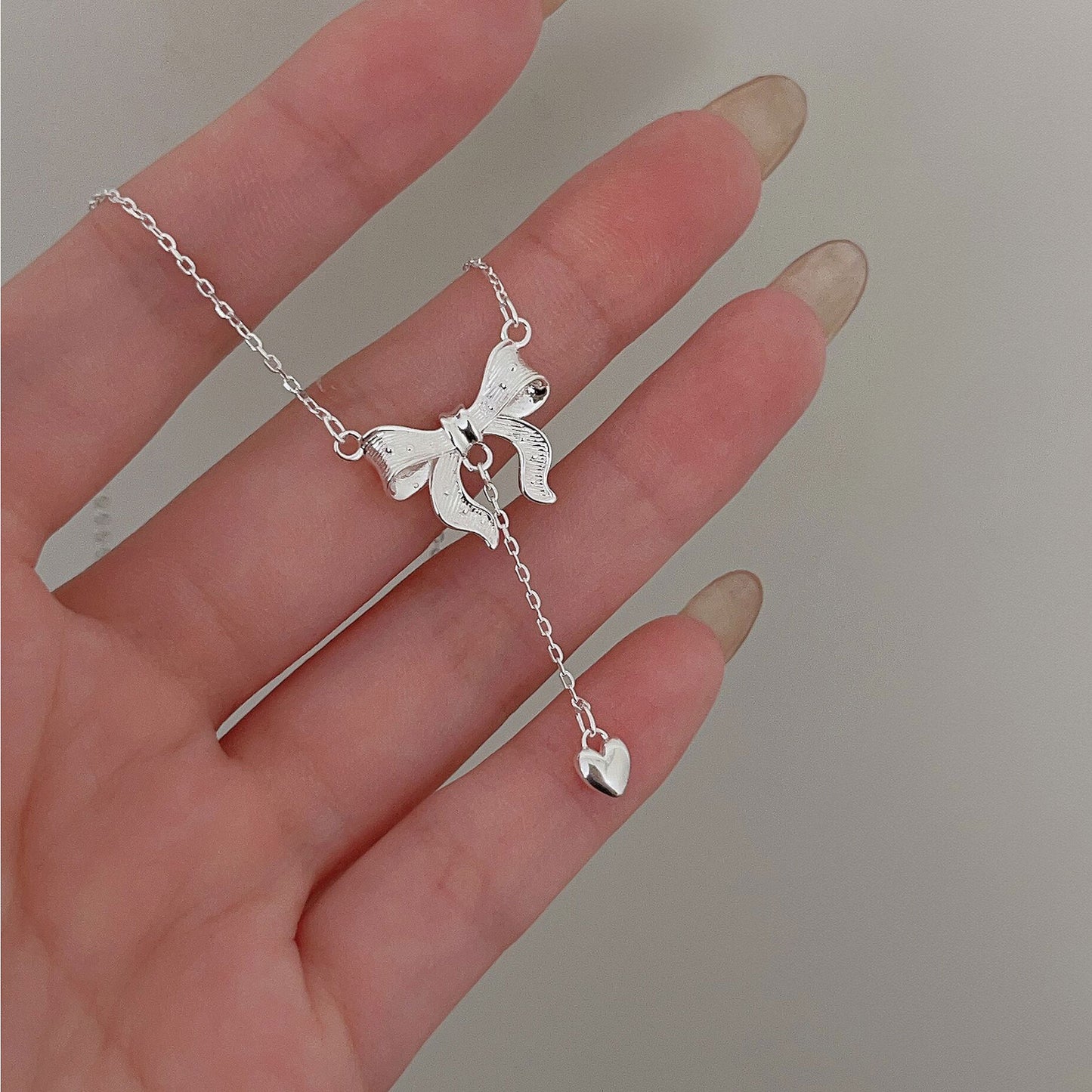 C3廠 韓國韓版簡約蝴蝶結流蘇S925純銀項鍊批發 折扣@洽客服 25.03.W2「xl064」