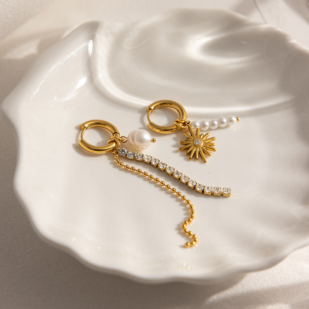 B廠 歐美款 鋯石芒星流蘇鈦鋼鍍18K金耳環 批發 折扣@洽客服  26.02.W3「JDE0211202」