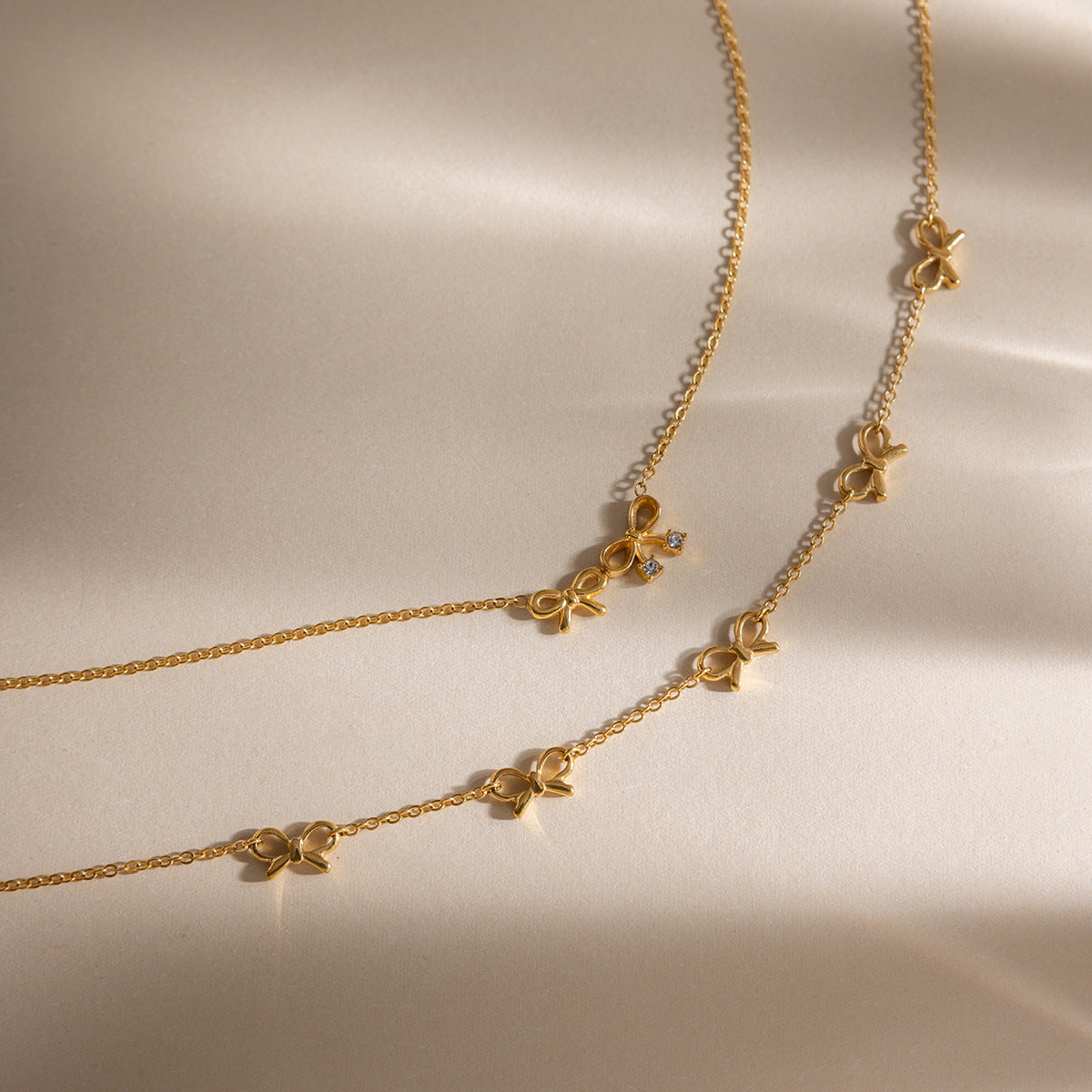 B廠 歐美款蝴蝶結吊墜鈦鋼鍍18K金項鍊批發 折扣@洽客服 26.03.W2「JDN0212209 JDN0212210 」