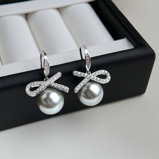 A廠 銅鍍白K｜日韓款輕奢鋯石蝴蝶結灰珍珠銀針耳環 批發 折扣@洽客服 26.02.W3「3969」