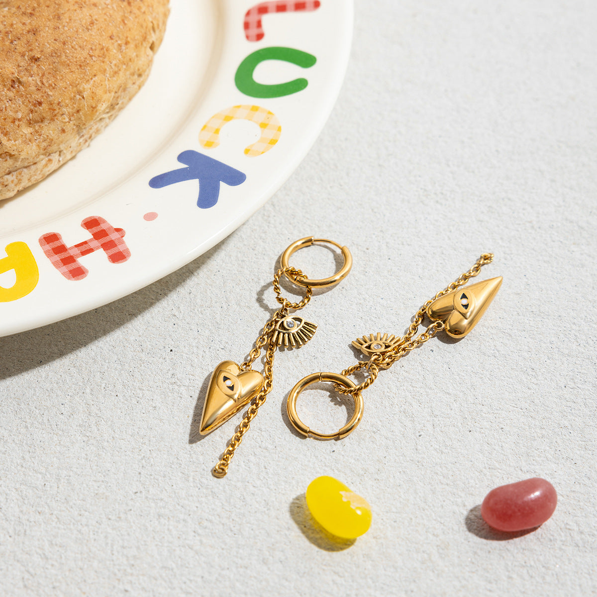 B廠 歐美款 惡魔之眼愛心流蘇 鈦鋼鍍18K金耳環 批發 折扣@洽客服 25.10.W5「JDE0305084」